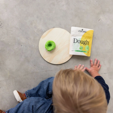 Child playing with dough